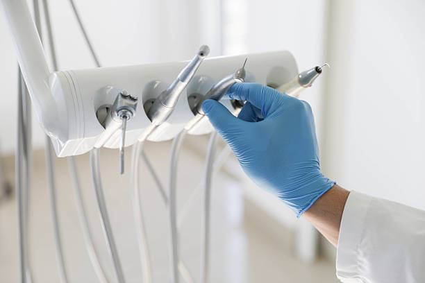 Professional Tooth Extraction technician working in Montgomery, IL